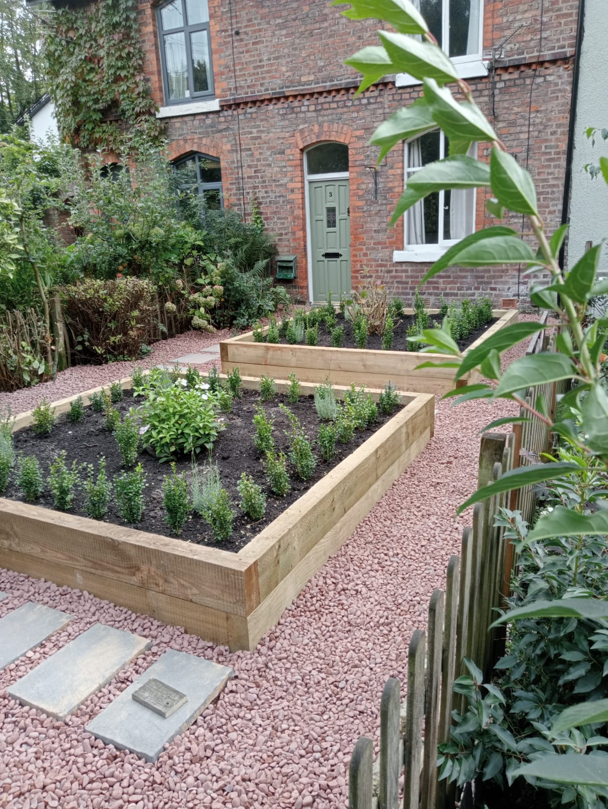 Cottage garden with raised wooden beds